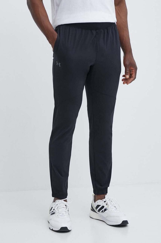 Under Armour spodnie dresowe tkanina czarny 1382119