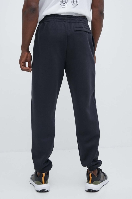 Odzież Under Armour spodnie dresowe 1383067 czarny