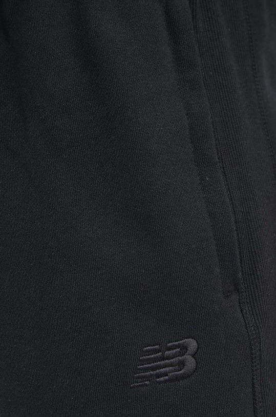 Bavlnené tepláky New Balance čierna MP41508BK