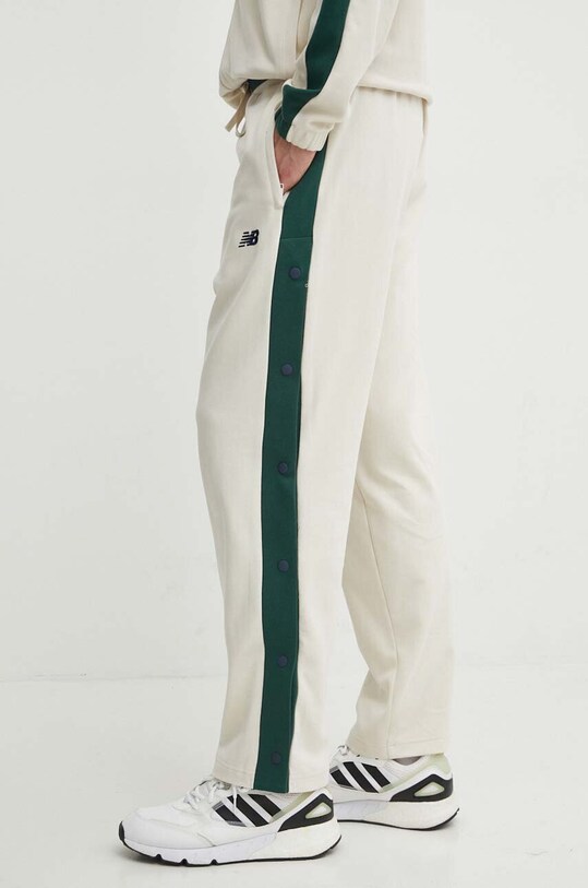 New Balance pantaloni de trening din bumbac MP41504LIN bej SS24