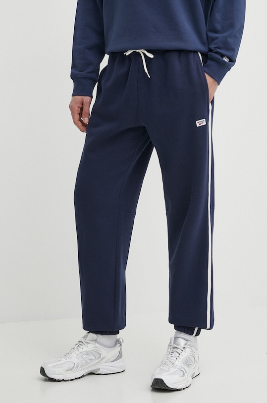 Reebok pantaloni de trening Court Sport tricotaj bleumarin 100075479