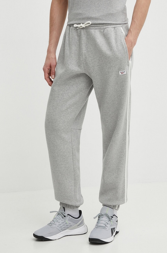 Tepláky Reebok Court Sport melanž sivá 100076382