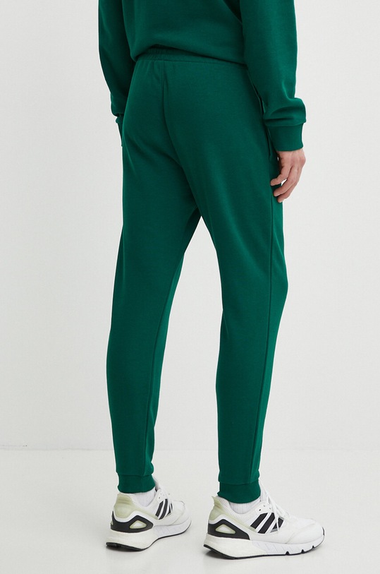 Odzież Reebok spodnie dresowe Identity 100076444 zielony