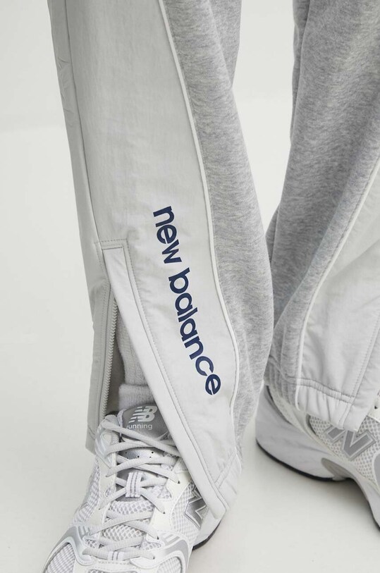 Tepláky New Balance Hoops šedá MP41582AGT