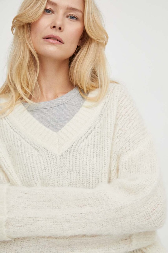 American Vintage sweter wełniany PULL ML COL V BYM18AE24 beżowy