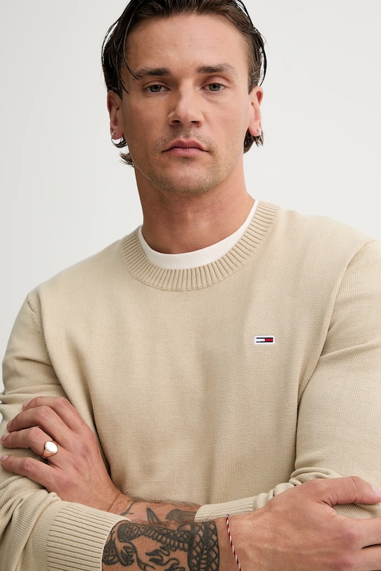 Бавовняний светр Tommy Jeans бежевий DM0DM18895