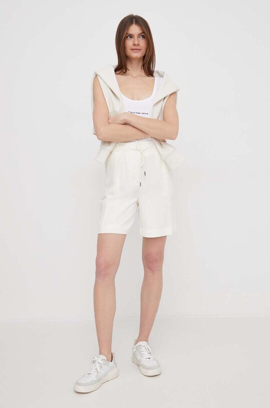 Шорти Calvin Klein K20K206651 бежевий SS24