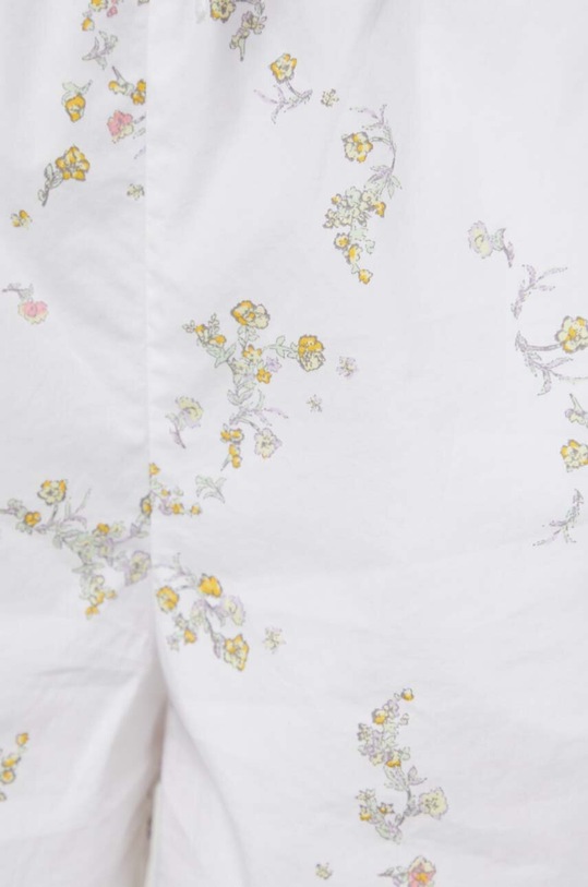 Tommy Jeans szorty bawełniane beżowy DW0DW17778