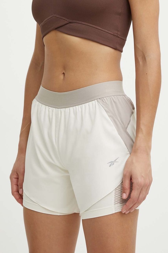 Reebok pantaloni scurți de alergare tricotaj bej 100076065