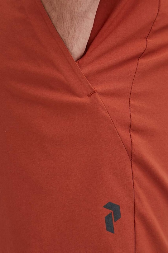 Turistické šortky Peak Performance Commuter červená G79987