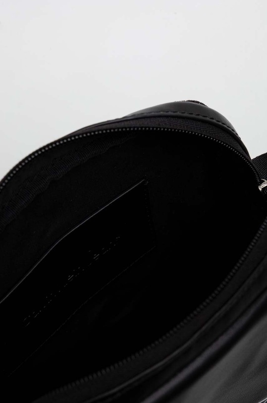 Torbica za okoli pasu Calvin Klein Jeans K50K511523 črna