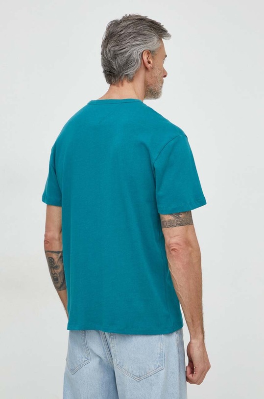 Tommy Jeans t-shirt bawełniany DM0DM17995 turkusowy AW24