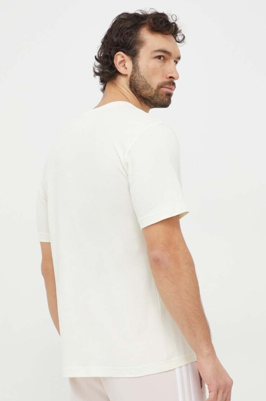 Одежда Хлопковая футболка adidas Originals Essential Tee IR9694 жёлтый