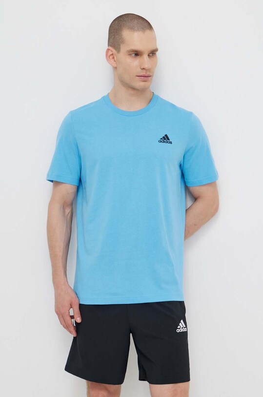 Бавовняна футболка adidas блакитний IS1317