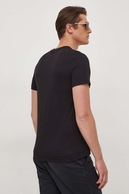 Ρούχα Βαμβακερό μπλουζάκι Versace Jeans Couture 76GAHT00 μαύρο