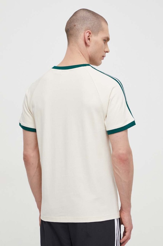 Одежда Хлопковая футболка adidas Originals IU0217 бежевый