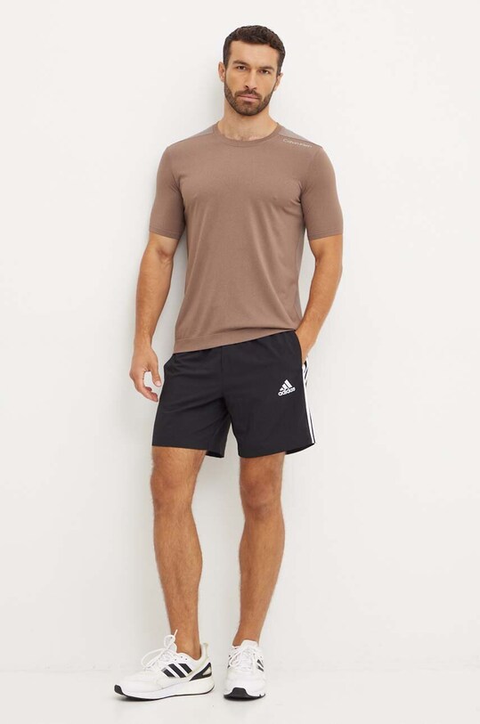 Tréninkové tričko Calvin Klein Performance 00GMS4K164 hnědá AW24