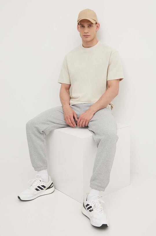 Хлопковая футболка Puma 624009 бежевый SS25