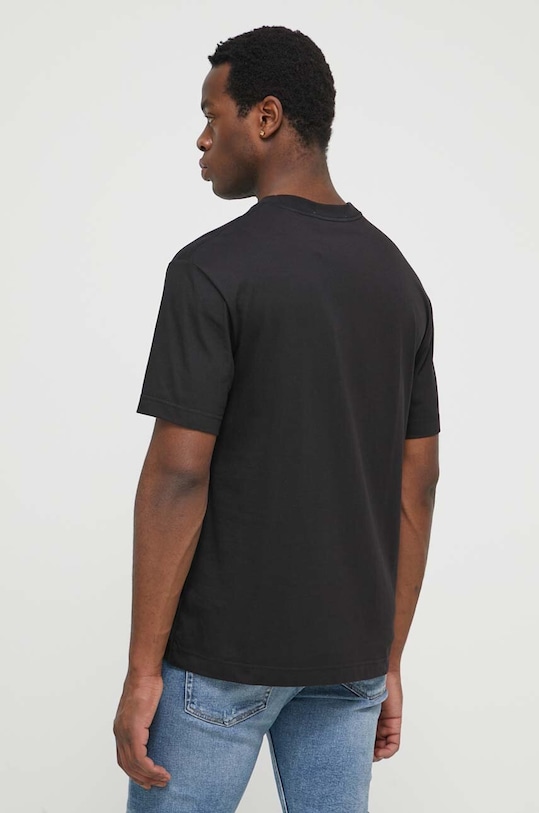 Ρούχα Βαμβακερό μπλουζάκι Calvin Klein Jeans J30J325200 μαύρο