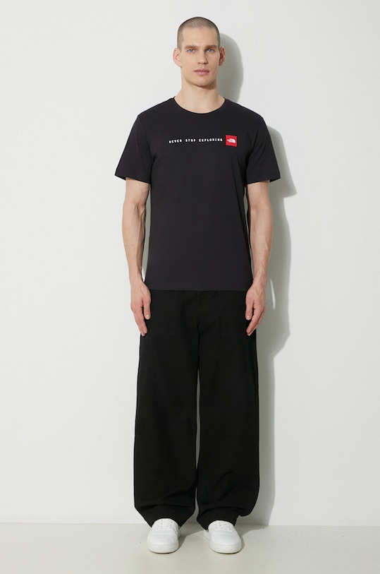 The North Face t-shirt bawełniany M S/S Never Stop Exploring Tee NF0A87NSJK31 czarny SS24