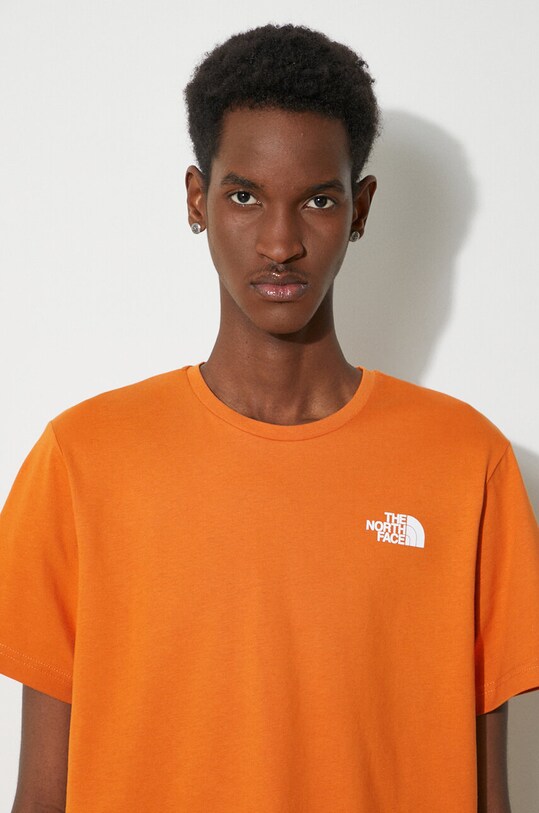 The North Face t-shirt bawełniany M S/S Redbox Celebration Tee NF0A87NVPCO1 pomarańczowy