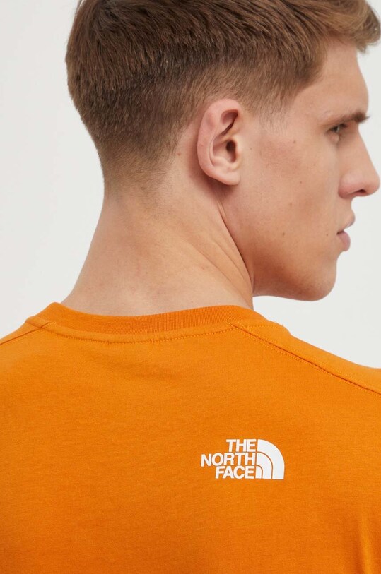 The North Face tricou din bumbac NF0A87FFPCO1 portocaliu