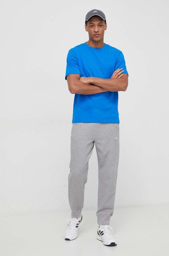 Bavlnené tričko New Balance MT41533BUL modrá SS24