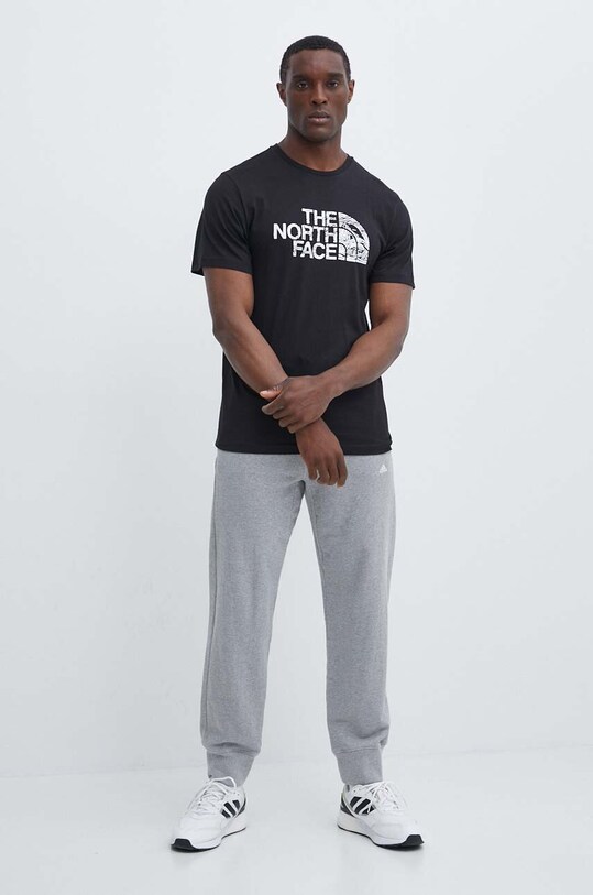 Βαμβακερό μπλουζάκι The North Face NF0A87NXJK31 μαύρο SS24