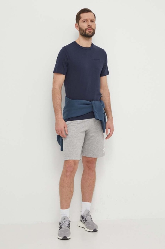 Бавовняна футболка Peak Performance G79570 темно-синій SS25