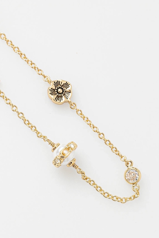 Браслет Coach 37517795GLD107 золотой SS25