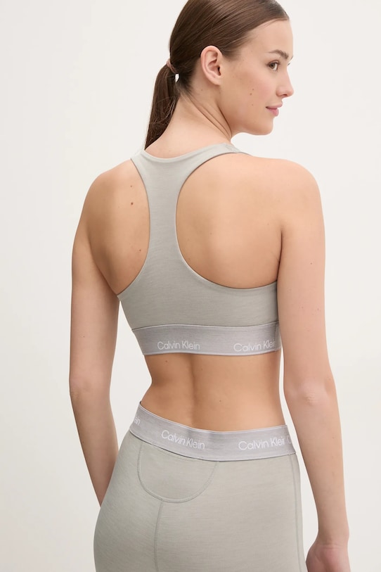 Одежда Спортивный бюстгальтер Calvin Klein Performance LVGWS5K138 серый
