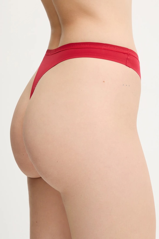 Odzież Calvin Klein Underwear stringi LV00QF7820 bordowy