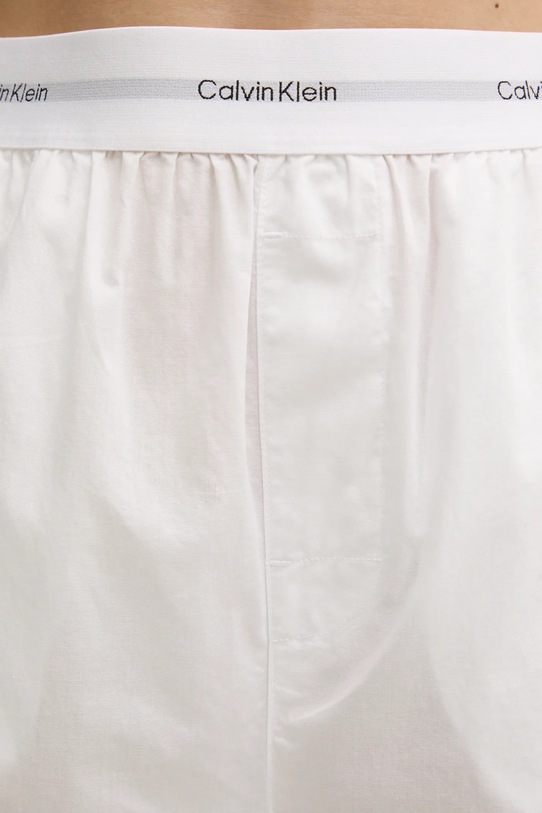 Одежда Хлопковые пижамные брюки Calvin Klein Underwear LV00QS7410 белый