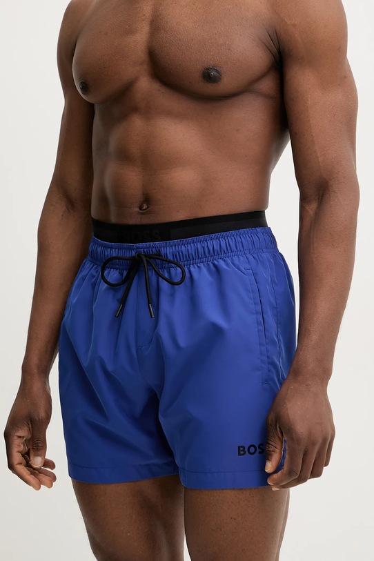 Plavkové šortky BOSS 50515294 modrá SS25