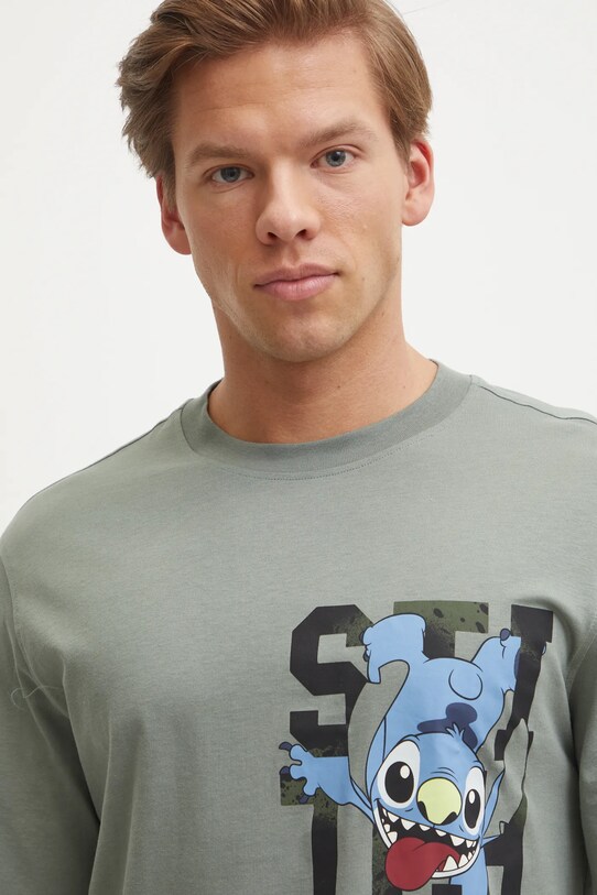 Одежда Хлопковая пижамная футболка United Colors of Benetton LILO&STITCH 30964M01Y зелёный