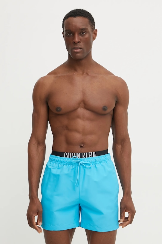 Plavkové šortky Calvin Klein Planet friendly modrá KM0KM01093