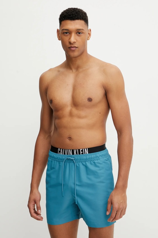 Calvin Klein szorty kąpielowe Planet friendly turkusowy KM0KM01093