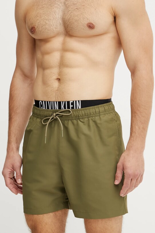 Plavkové šortky Calvin Klein KM0KM01093 zelená SS25