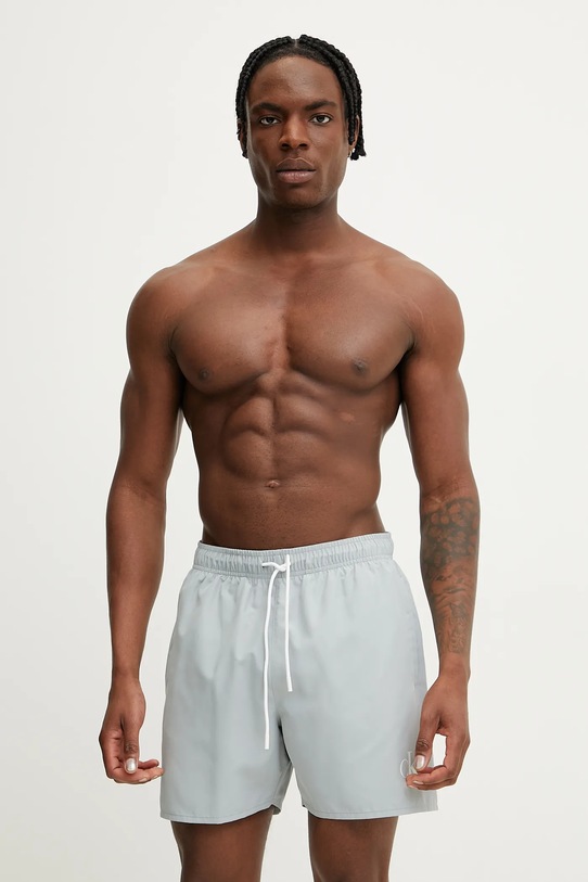 Plavkové šortky Calvin Klein KM0KM01101 modrá SS25