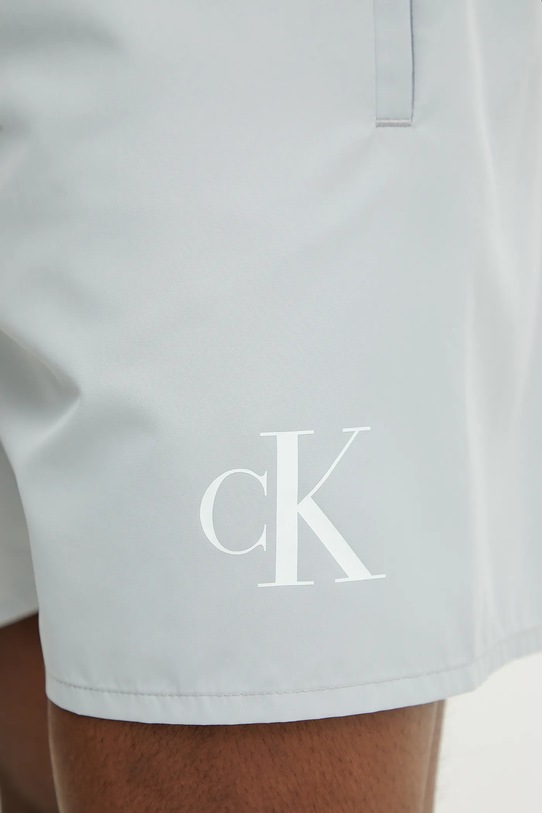 Plavkové šortky Calvin Klein modrá KM0KM01101