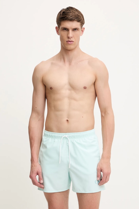 Calvin Klein pantaloncini da bagno Planet friendly turchese KM0KM01101