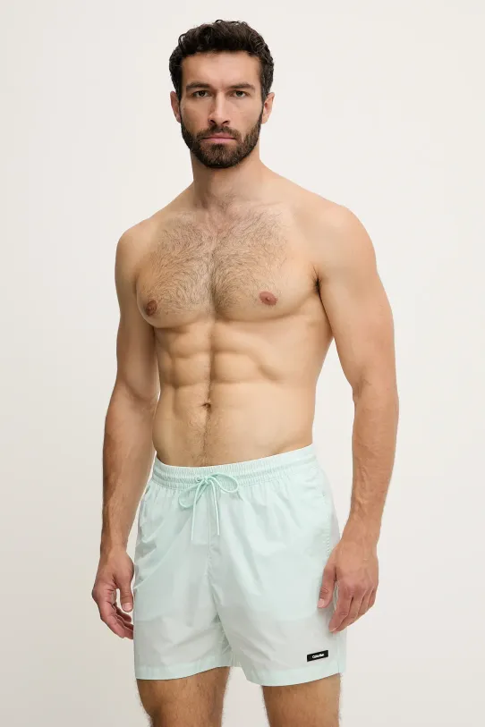 Plavkové šortky Calvin Klein tyrkysová KM0KM01111