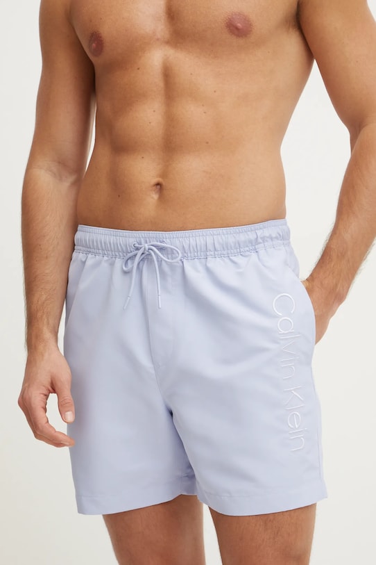 Купальні шорти Calvin Klein аплікація блакитний KM0KM01166