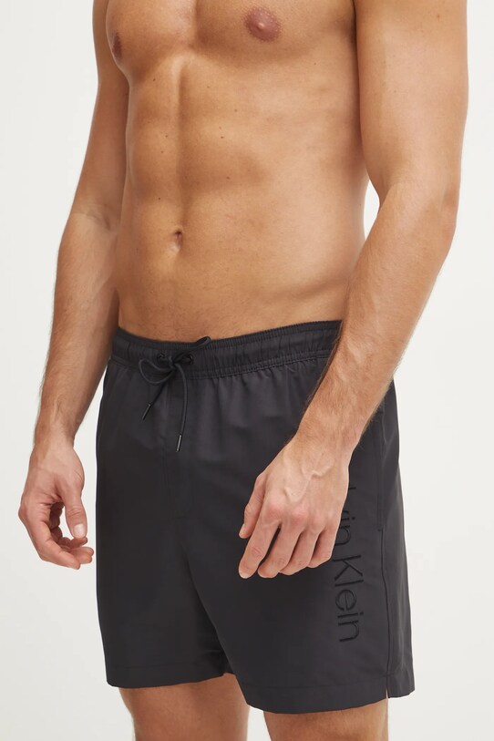 Plavkové šortky Calvin Klein nášivka čierna KM0KM01166