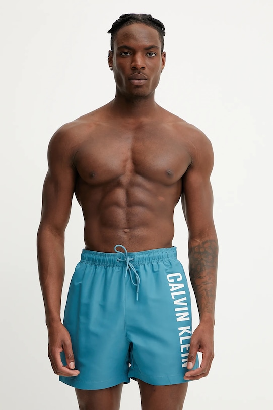 Calvin Klein pantaloncini da bagno Planet friendly turchese KM0KM01092
