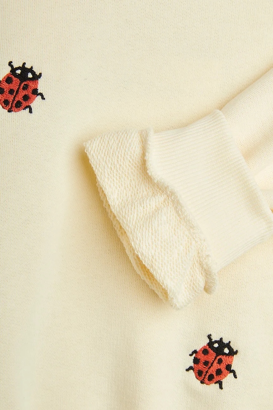Mini Rodini bluza bawełniana dziecięca Ladybugs 2522010711 beżowy