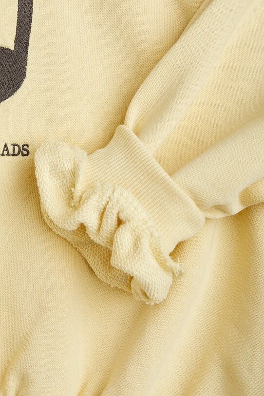 Mini Rodini bluza bawełniana dziecięca Note 2522011623 żółty