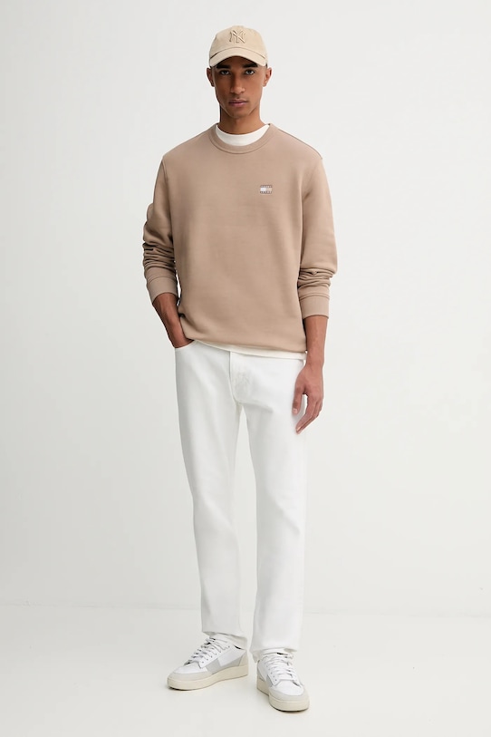 Хлопковая кофта Tommy Jeans DM0DM20660 бежевый SS25