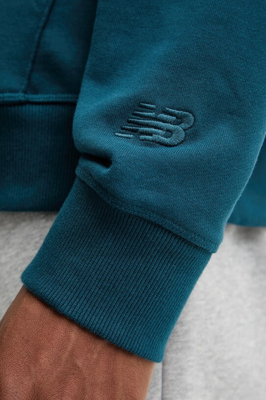 Bavlněná mikina New Balance MT51979DOE tyrkysová