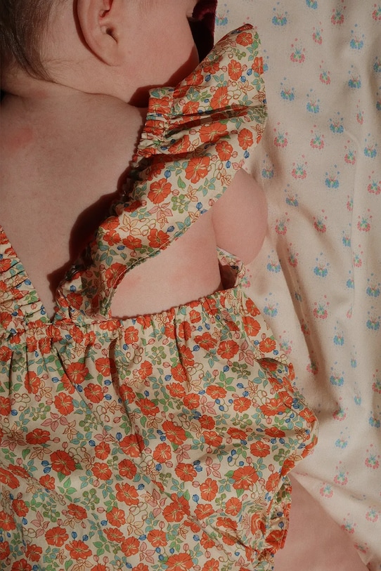 Konges Sløjd body bawełniane niemowlęce VERBENA ROMPER GOTS Produkt niemowlęcy pomarańczowy KS102299